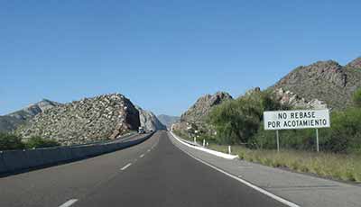 Do not pass sign on roadway in Mexico