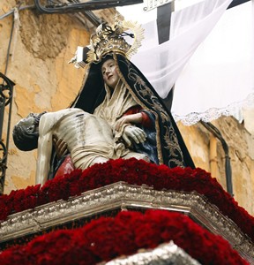 Holy week parade float with Virgin Mary holding Jesus