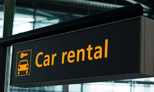 photo of a car rental sign in an airport