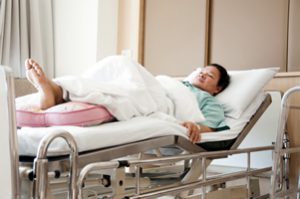 Person in Hospital Bed
