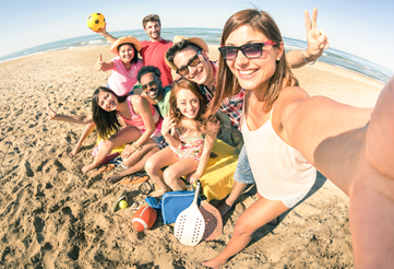 Group of people taking a selfie on the beach in Rocky Point, Mexico