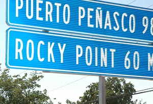Road sign to Rocky Point 60 miles