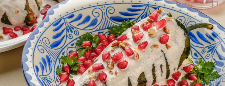 Chiles en nogada in decorative Mexican bowl