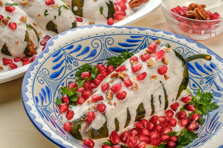 Chiles en nogada in decorative Mexican bowl
